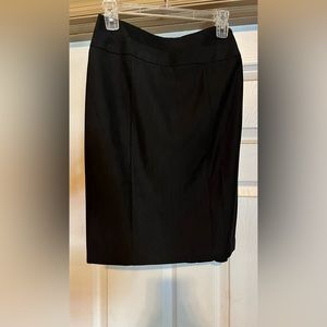 Skirt straight in front ruffle in back